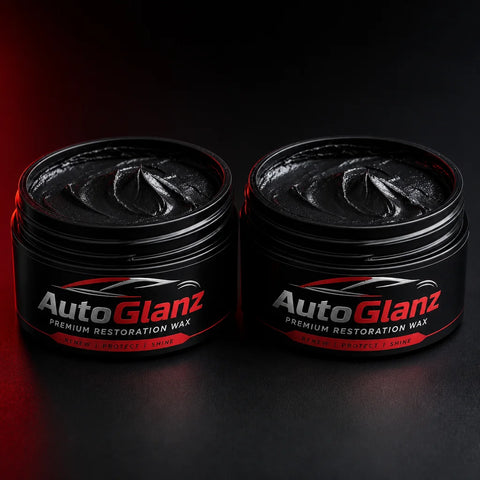 Square format studio packshot of two AutoGlanz jars, side by side, labels facing front, on a dark gr